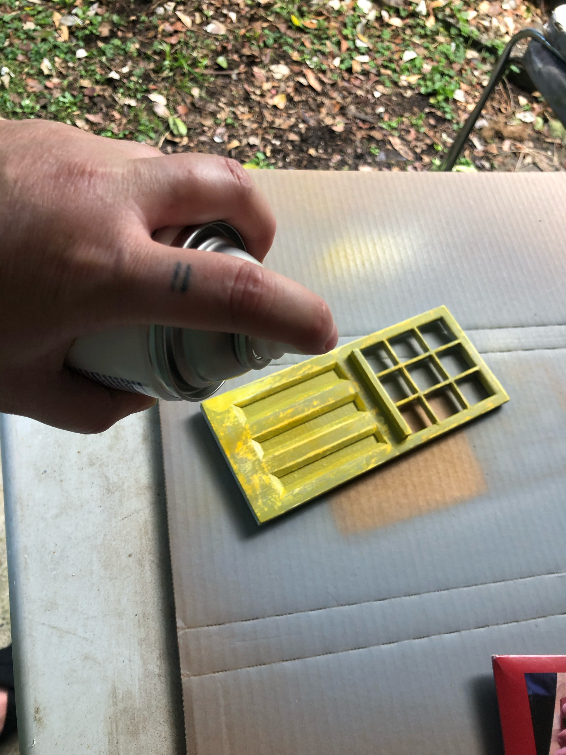 I primed the front, then sanded, and painted with a high gloss yellow spray paint