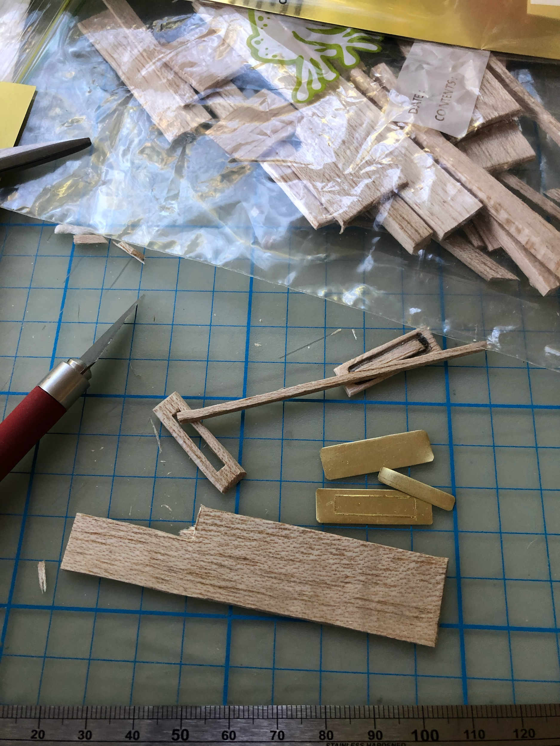 I made the letter box out of a mixture of brass, balsa and palight