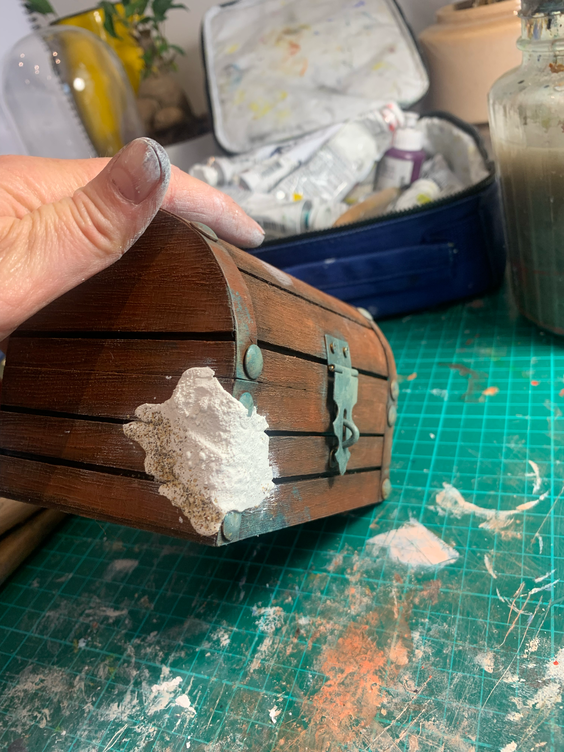 Creating rocky base for coral using textured rocks in epoxy sculpt 