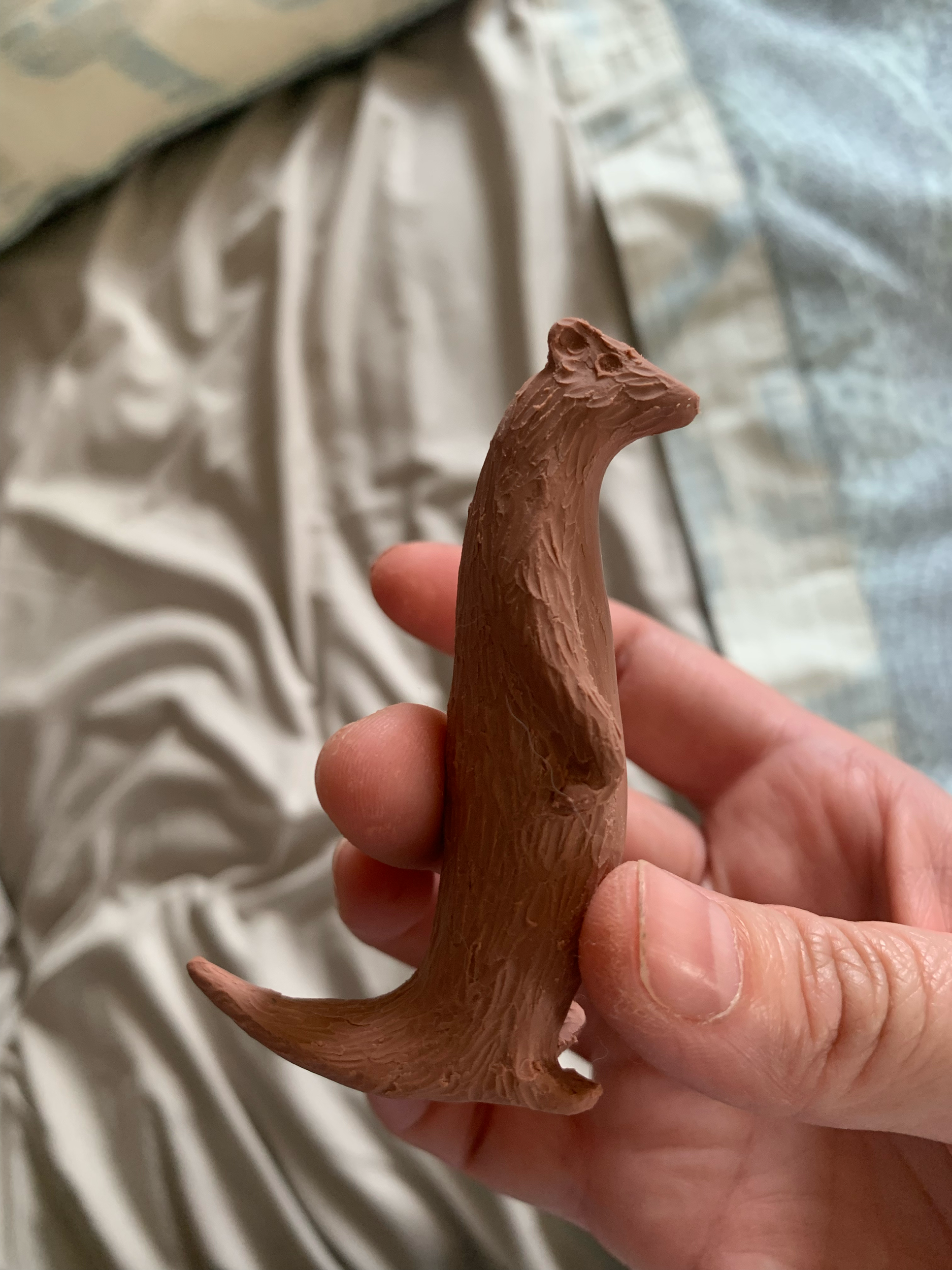Weasel sculpted from Chavant