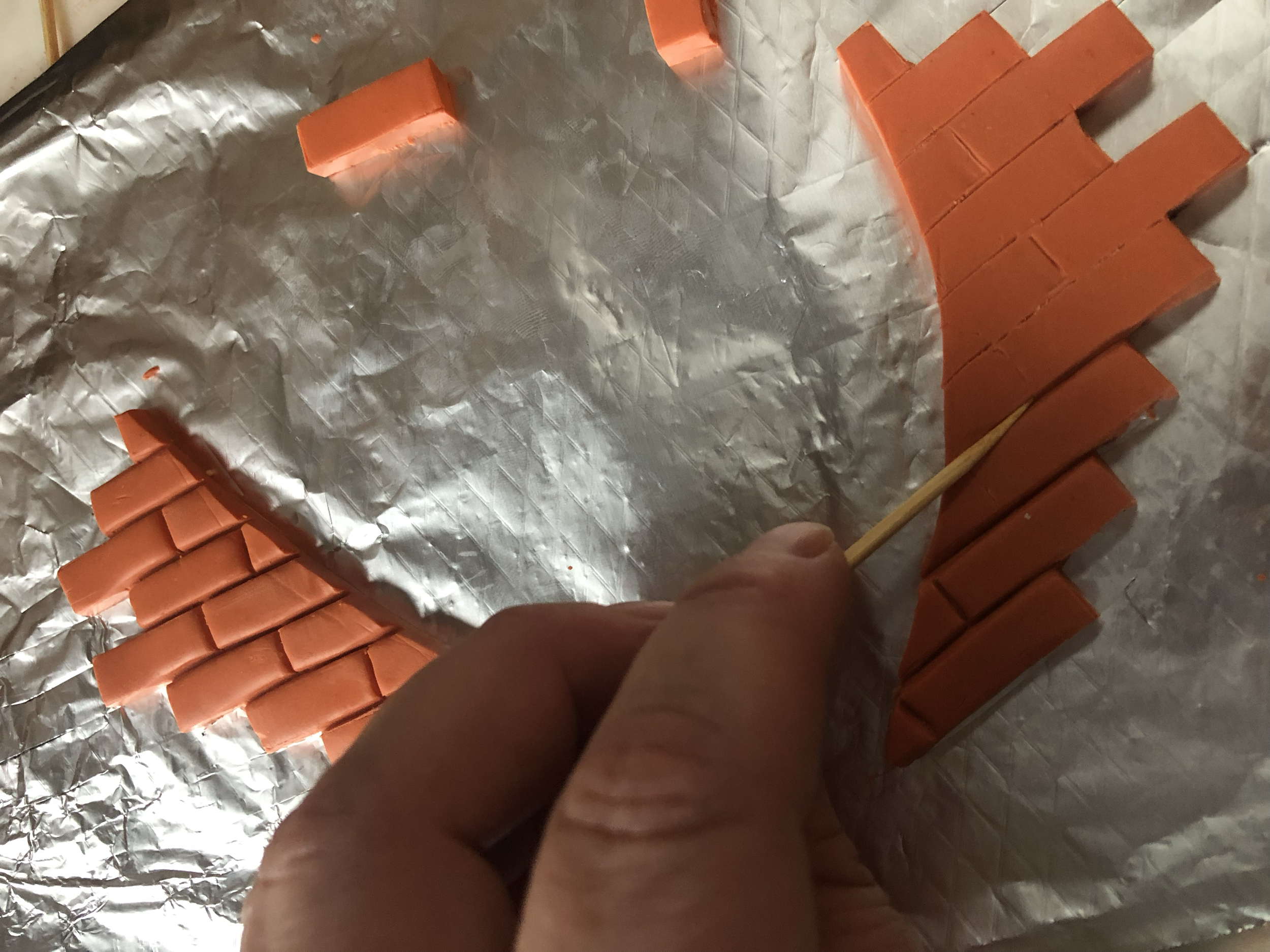 Creating surface bricks for the door surround from Sculpy