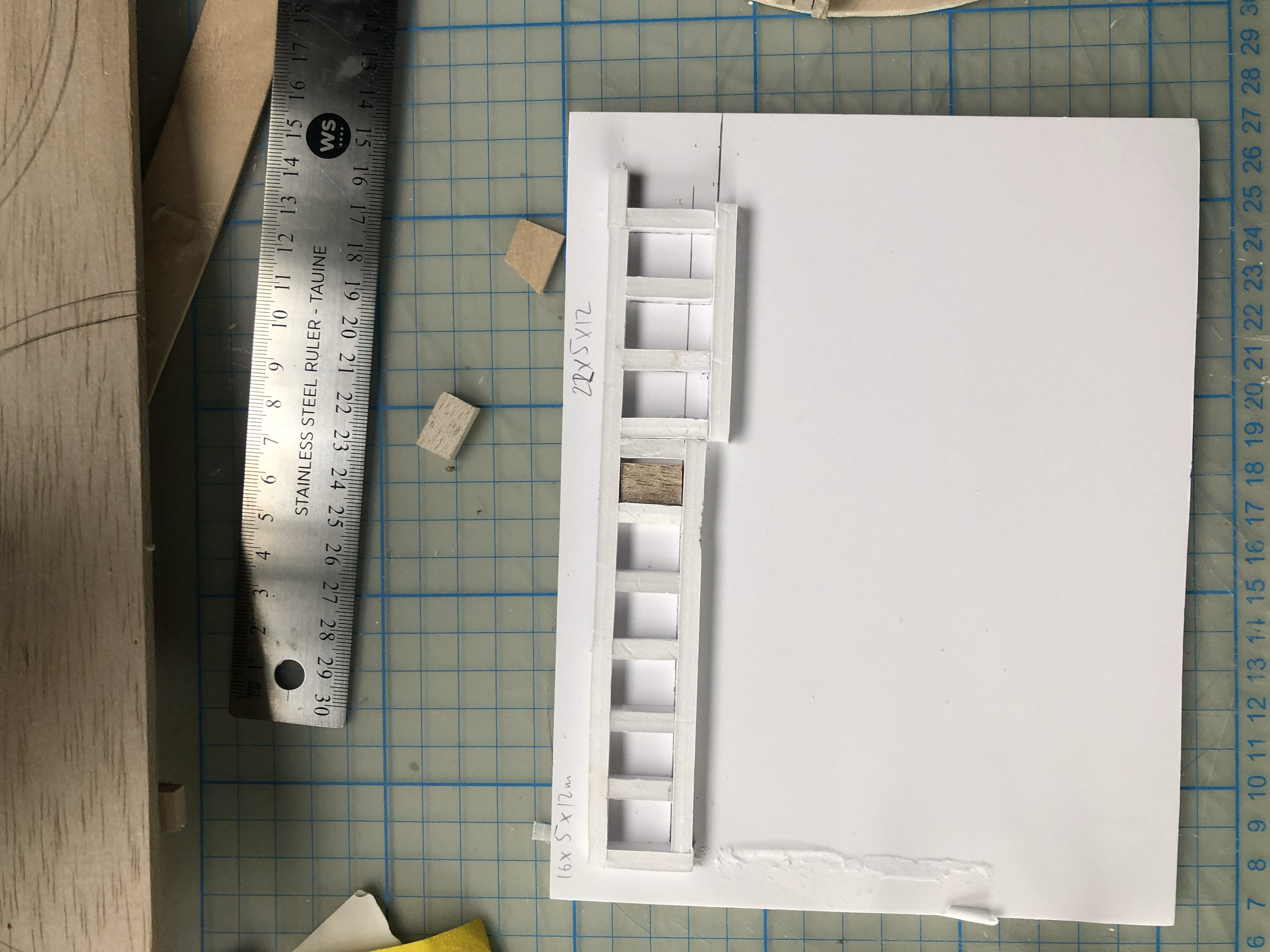 I then considered pouring bricks from colour plaster and made this simple foam board mold using a wooden brick
