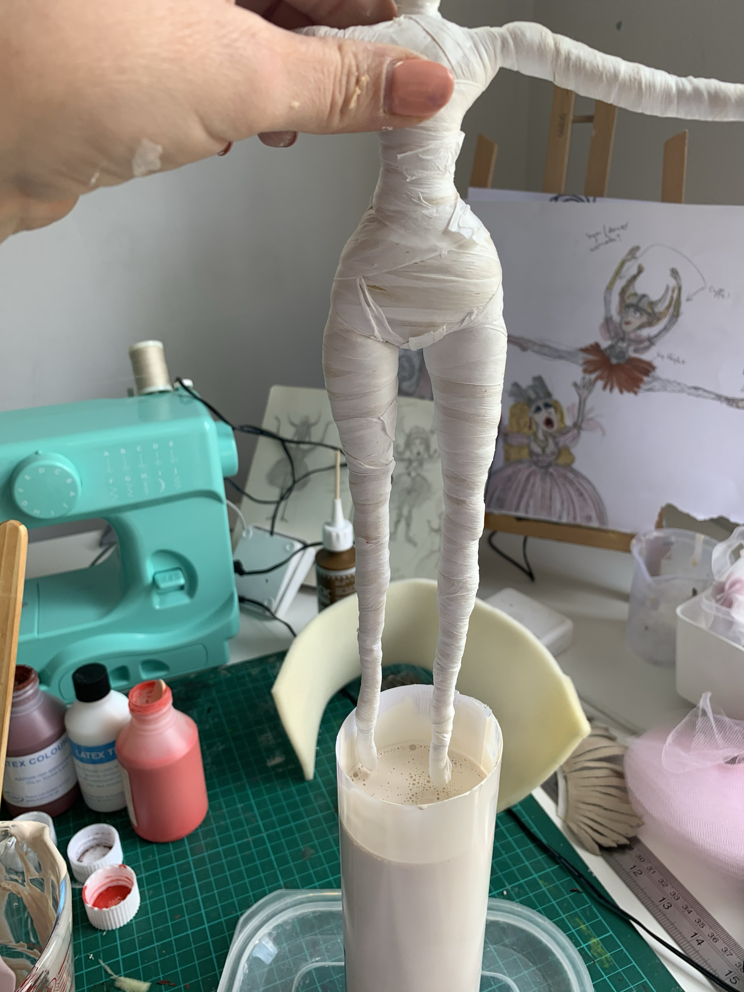 Dipping into latex and hanging to drip dry