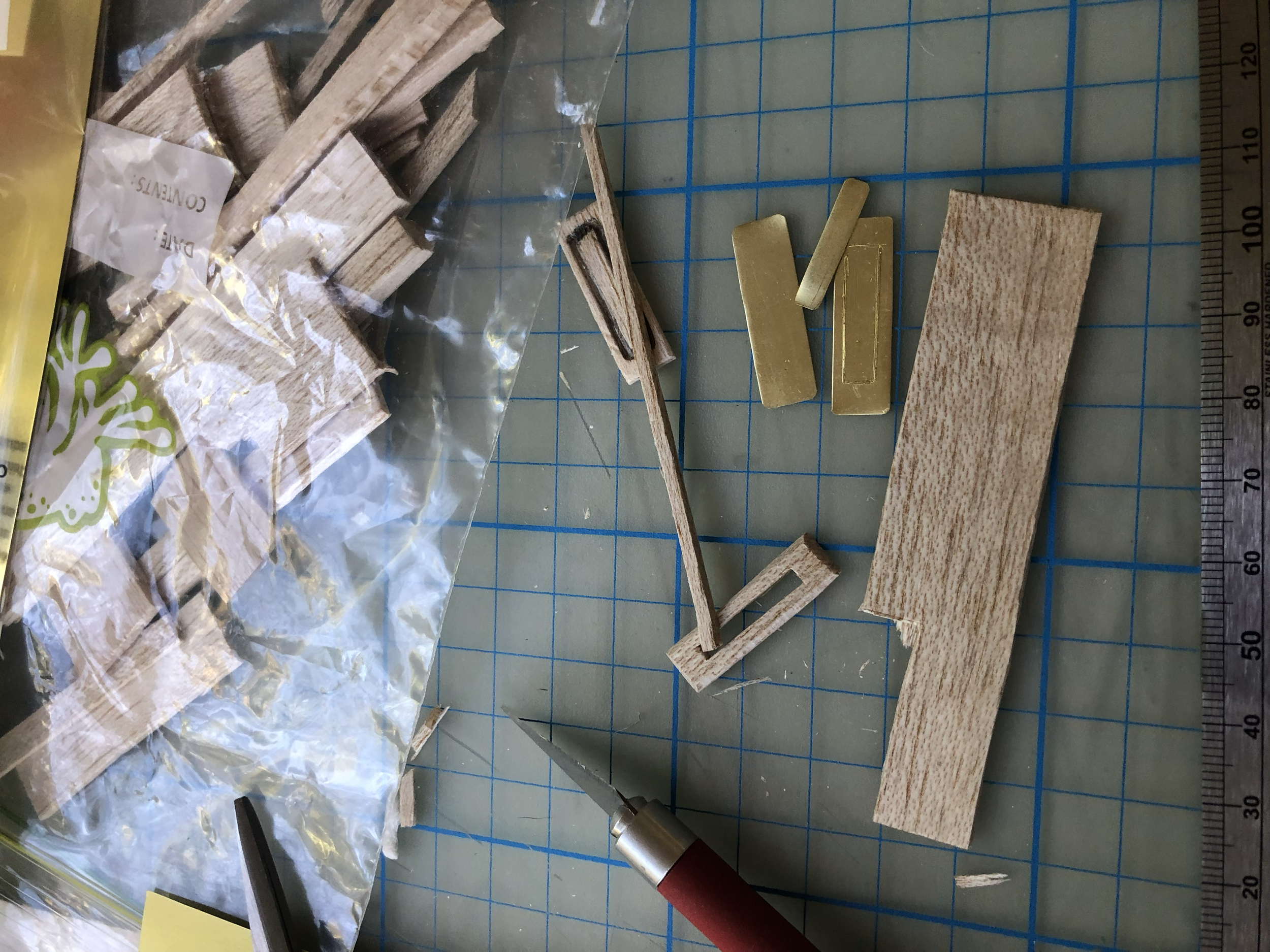 I made the letter box out of a mixture of brass, balsa and palight