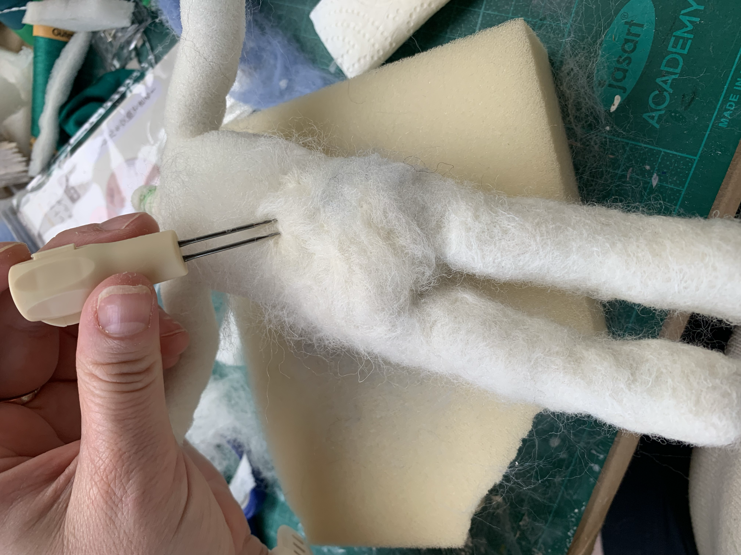 Made an armature for the puppet with aluminium wire and terminal blocks, and wrapped the armature in thin cushion foam before felting it