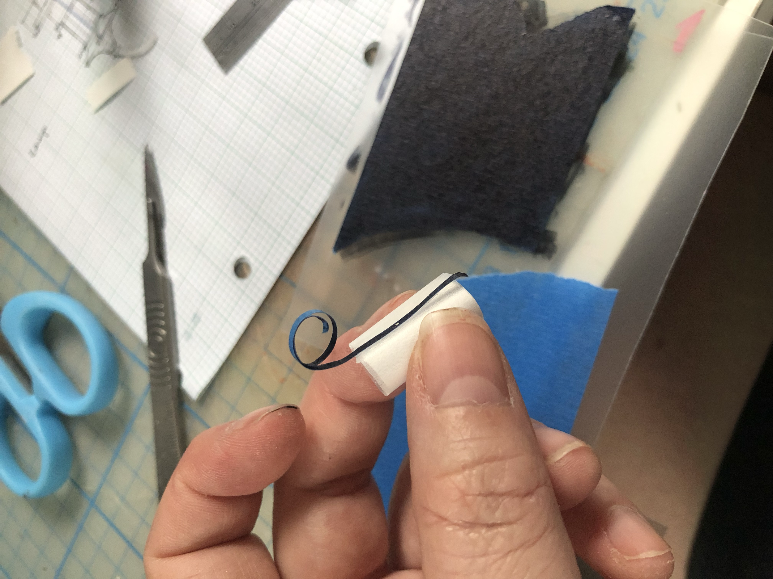 Making lamp from frosted plastic and painted tape strips