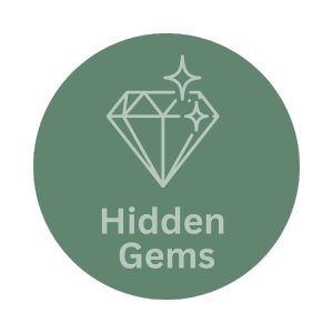 Circular badge with a diamond icon and the text 'Hidden Gems' underneath.