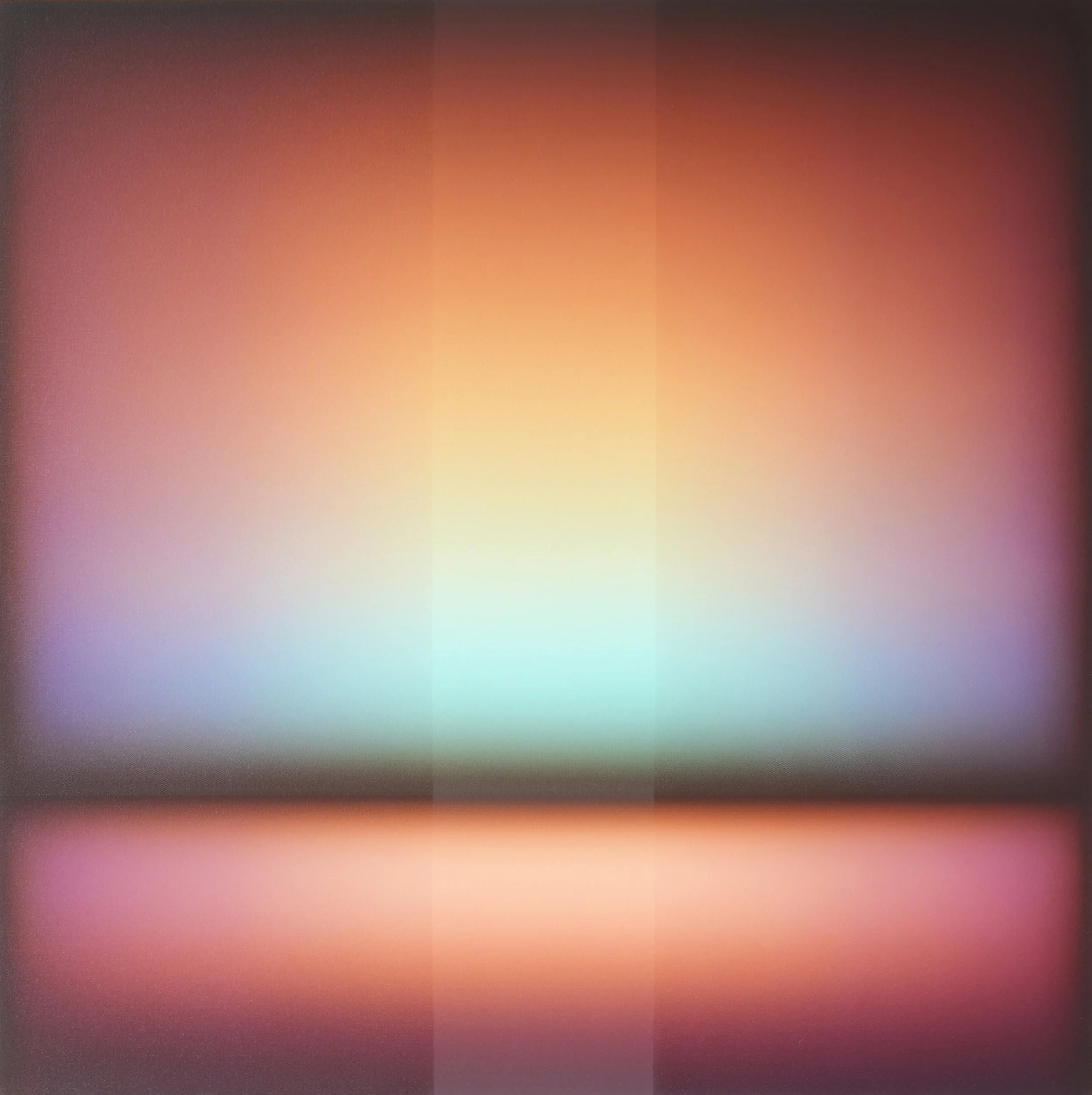 Blurred gradient background with warm colors including pink, orange, yellow, and purple.