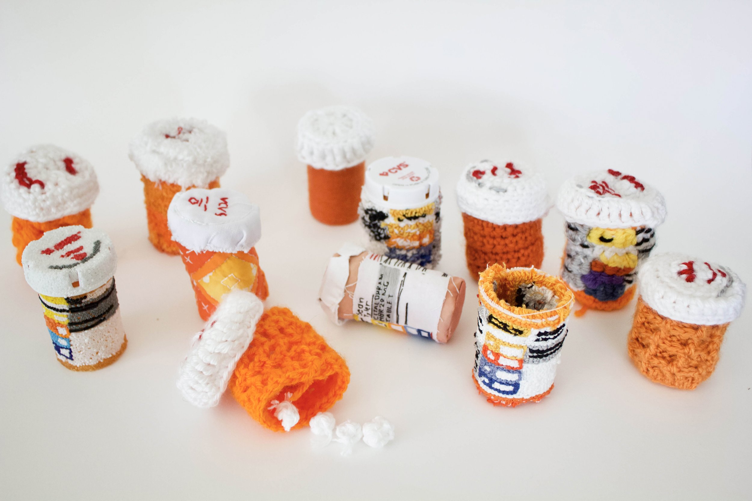 "Citalopram 20 mg, Hydroxyzine Pam 25mg, Bupropion 300mg" , 2021, Yarn, embroidery floss, cotton, glass beads, found plastic bottles, quilt batting. 12”x 12”x 6”