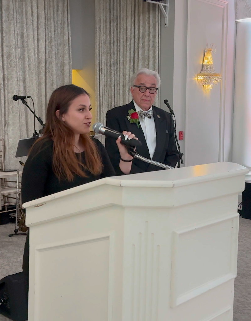 Scholarship-winner-at-podium2026.PNG