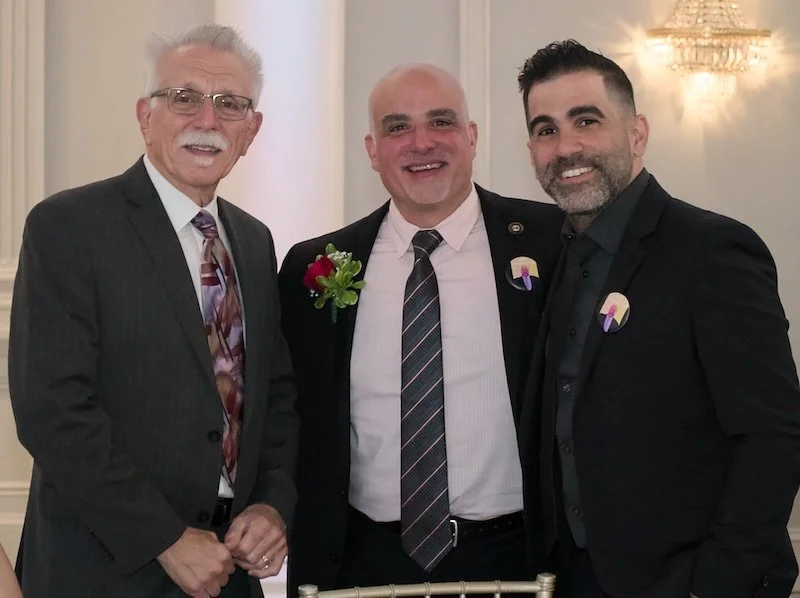 3-men-pose-smile.jpg