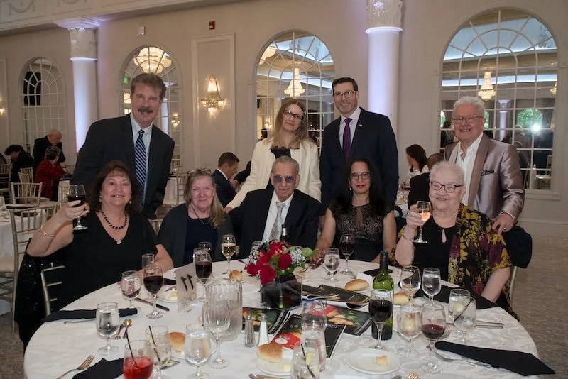 group-table-pose-cheers.jpg