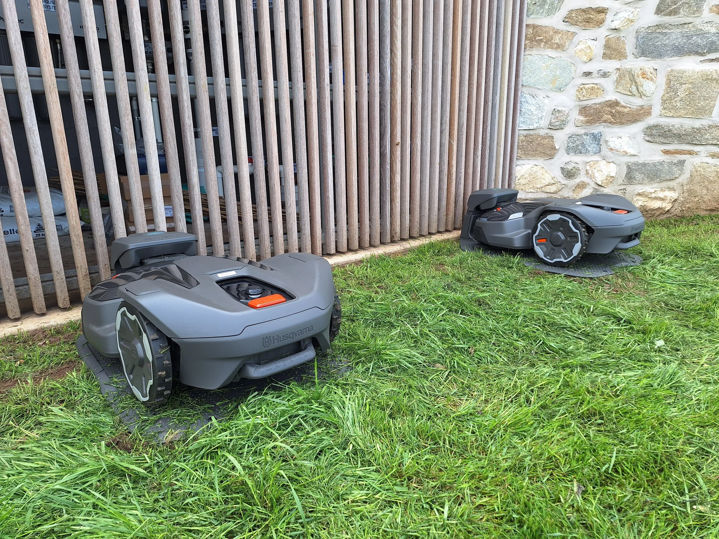 APS Pro Services technician installing robotic mower in Melbourne