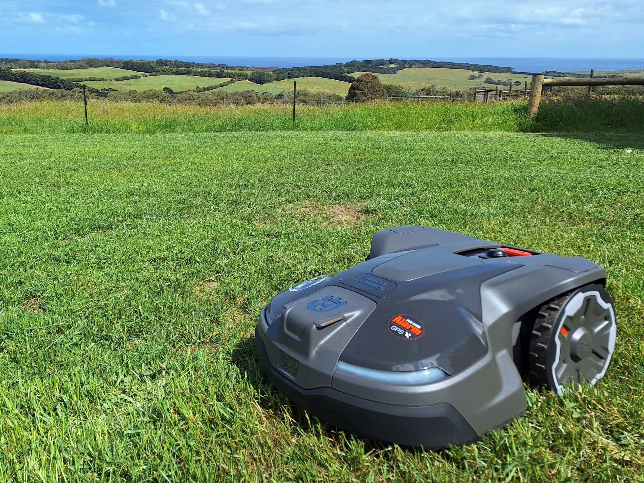 APS Pro Services technician installing robotic mower in Melbourne