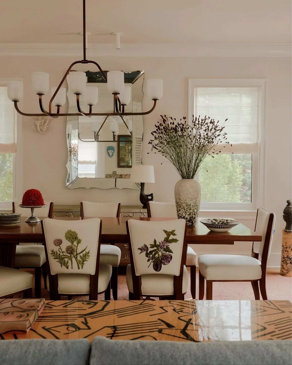 In the stunning home of @michellerago, designed by @bosstudio, every detail of this dining room tells a story - custom craftsmanship, vintage finds, and the promise of evenings that linger long after the last course. 

Photography by @william.jess.la
