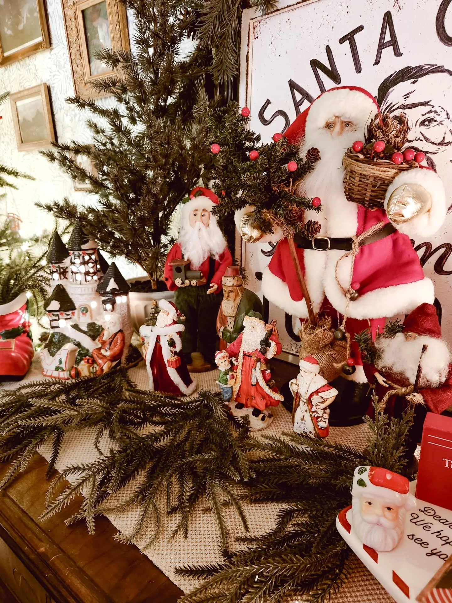 Some people decorate for Christmas.
I build little memories into the corners of my home.

Every Santa has a story.
Every tin once held cookies in someone else&rsquo;s kitchen.
Every tiny tree, every thrifted mug, every worn edge was chosen not for pe