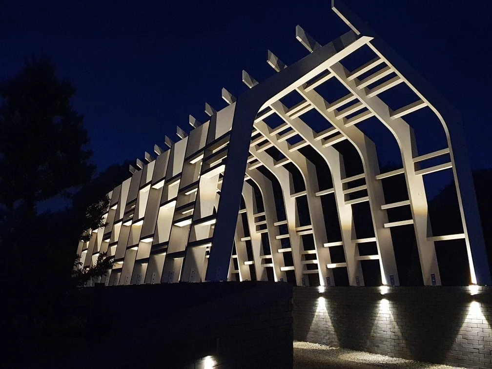 Nighttime view of Onemana Gateway