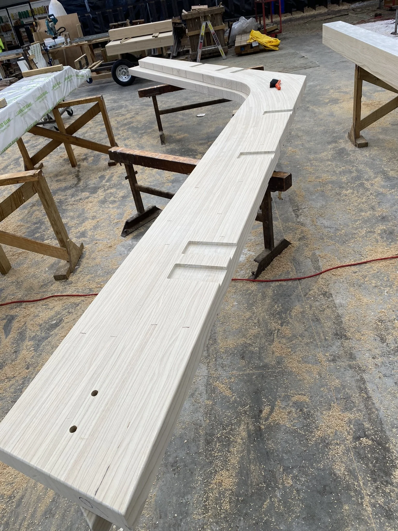 L-shaped custom glulam timber portals.