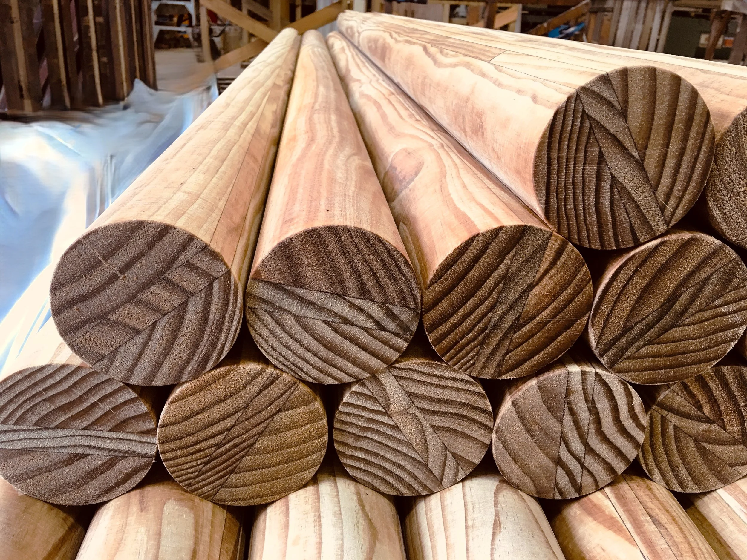 Close-up view of glulam timber rounds