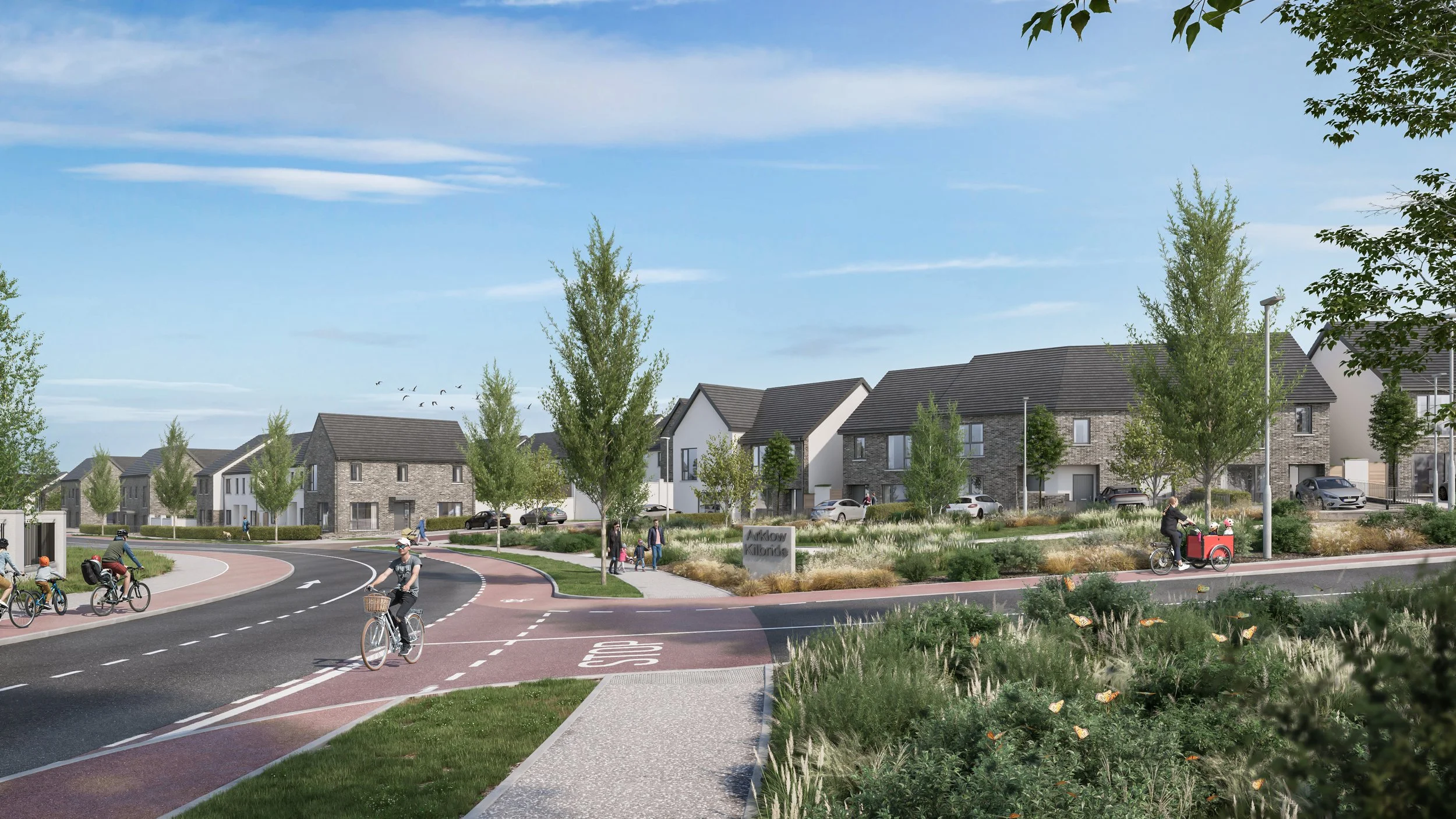 A residential neighborhood with modern houses, a bike lane, and pedestrians enjoying a sunny day.