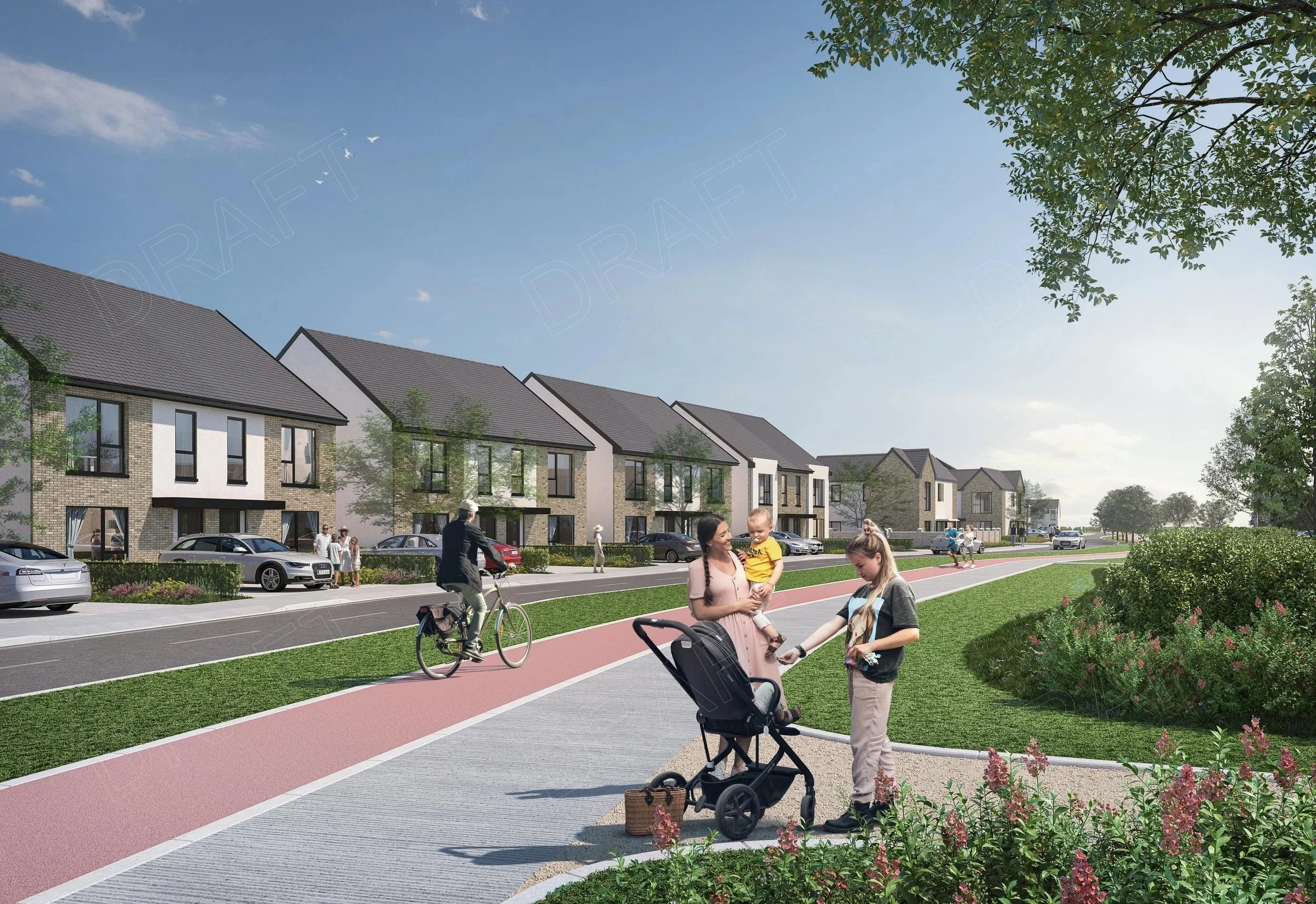 A modern residential neighborhood with townhouses, cars parked along the street, and a paved sidewalk with a separate red bike lane. People are walking, riding bikes, and a woman is talking to a young girl by a stroller in a grassy park area, with trees and shrubs around, under a blue sky with few clouds.