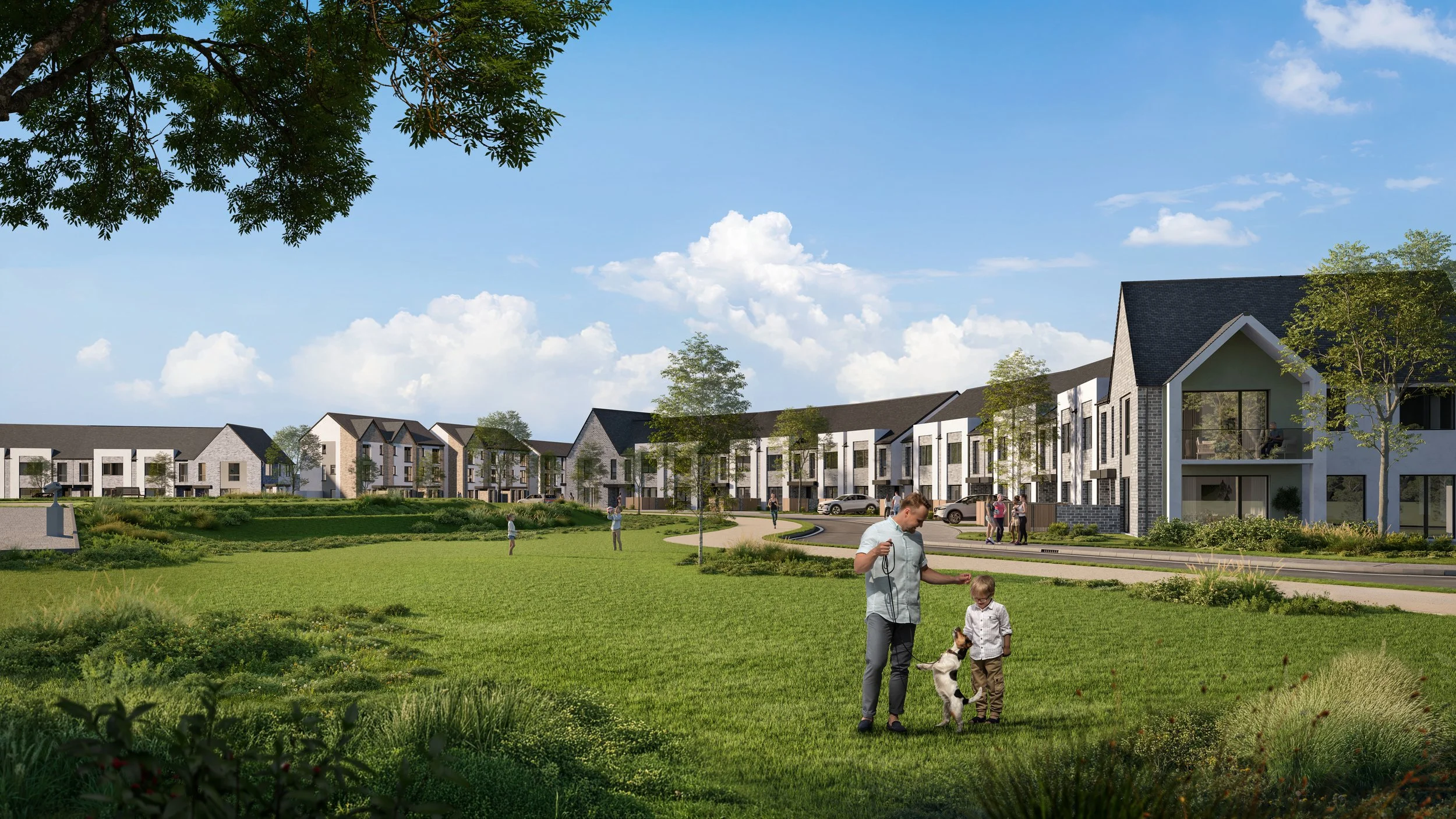 A residential neighborhood with modern townhouses, a large grassy park, trees, and people walking and playing with dogs under a blue sky with clouds.