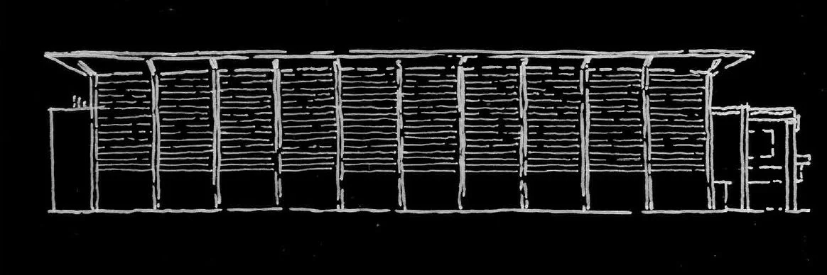 Line drawing of a rectangular building with a sloped roof, vertical support beams, and a small extension on the right side, set against a black background.