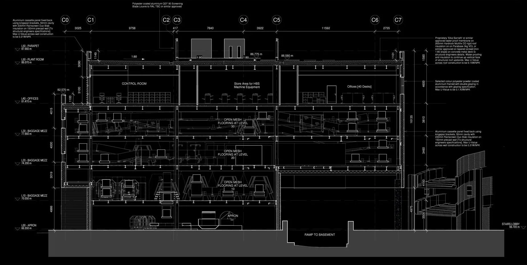 A detailed architectural building plan drawing showing a multi-level structure with various labeled areas such as control room, store area for machine equipment, offices, baggage mezzanine, apron, and stairs lobby. The plan includes measurements, construction notes, and design details.
