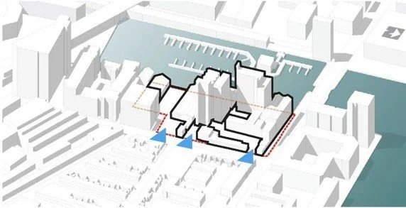 A 3D map of a city block highlighting a specific building complex, with blue markers indicating points of interest near the entrance. The area includes water bodies and surrounding buildings.