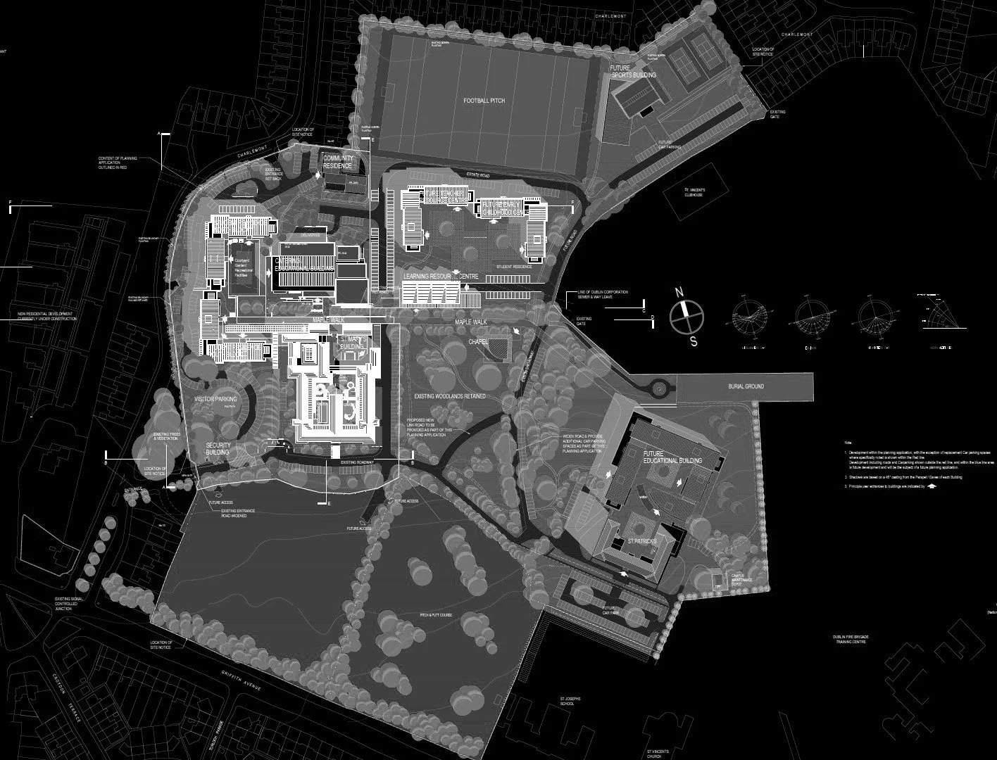 Site plan of a school or community complex showing buildings, parking lots, sports fields, wooded areas, pathways, and labels indicating different facilities and future developments, all in shades of black, white, and gray.