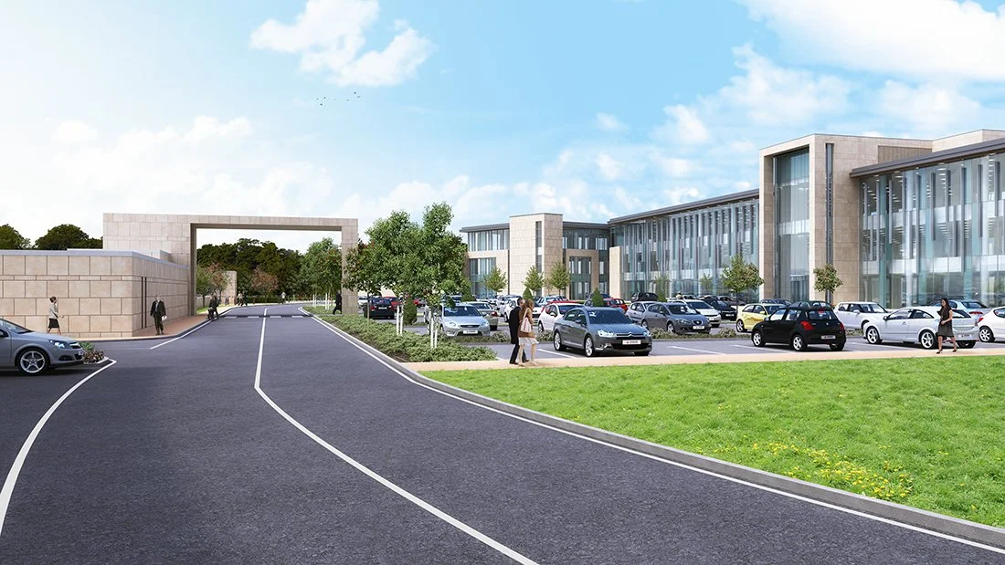Modern office building with glass windows and parking lot filled with cars, some people walking on the sidewalk, green grass, trees, and a clear blue sky.