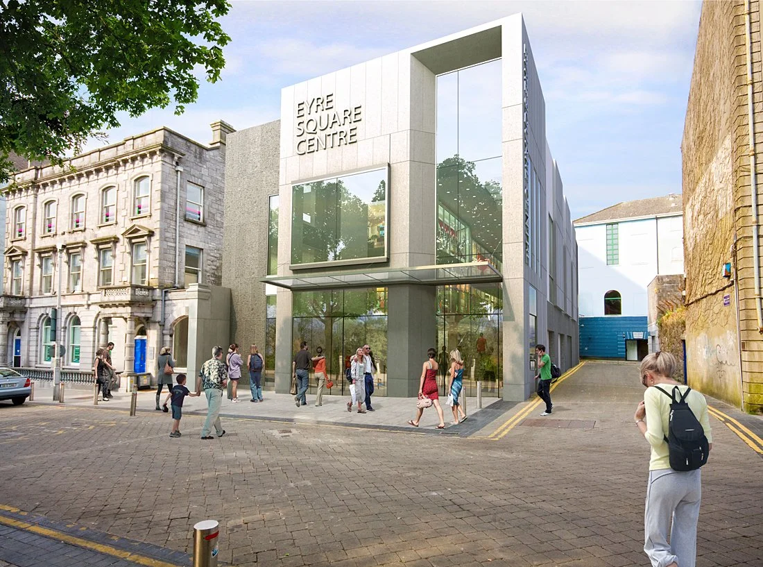 Modern glass-fronted building labeled "Eyre Square Centre" surrounded by people walking on the street.