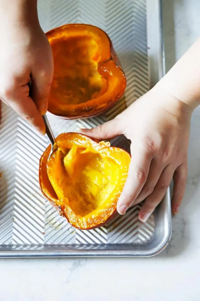 Showing us how to make pumpkin puree from scratch. Photo by Lexi’s Clean Kitchen.