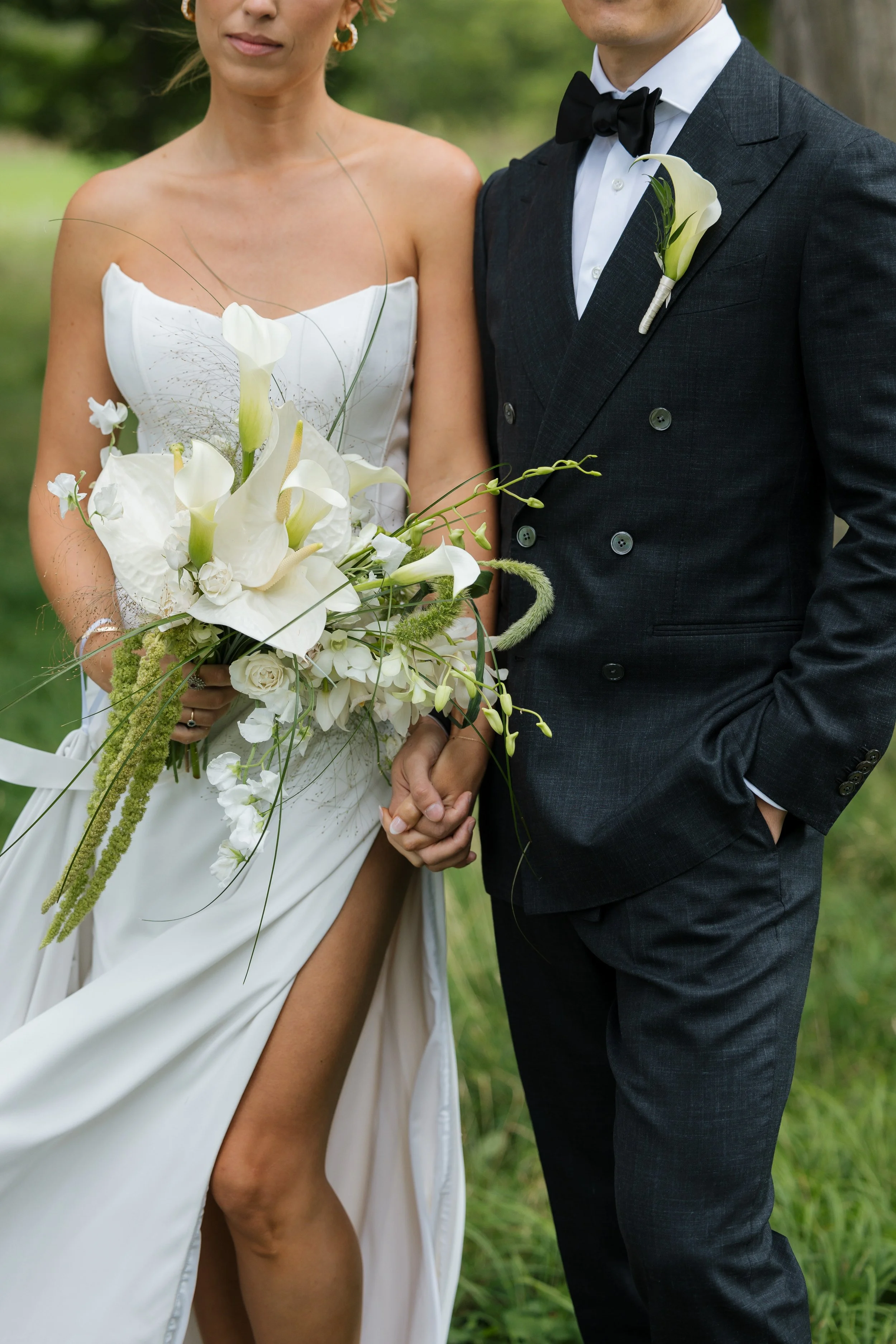 Luxury floral window display created by a Cambridge florist featuring fresh flowers and modern design