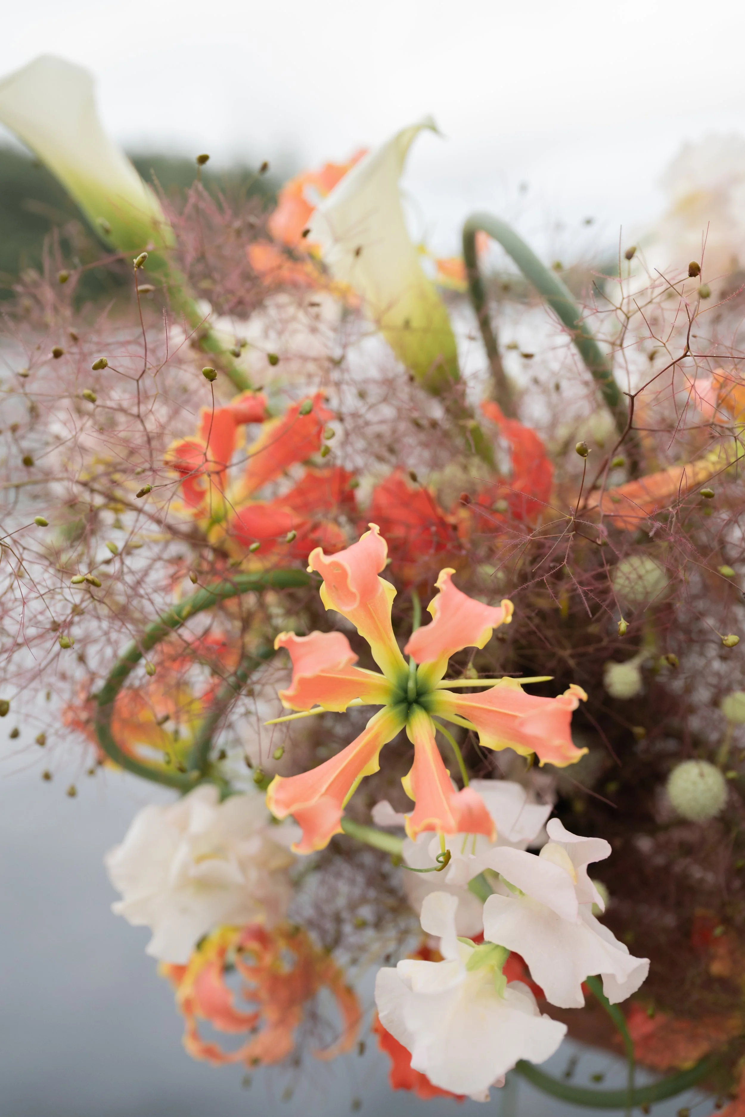 Vibrant floral tablescape with bold seasonal blooms for an intimate dinner party in Toronto
