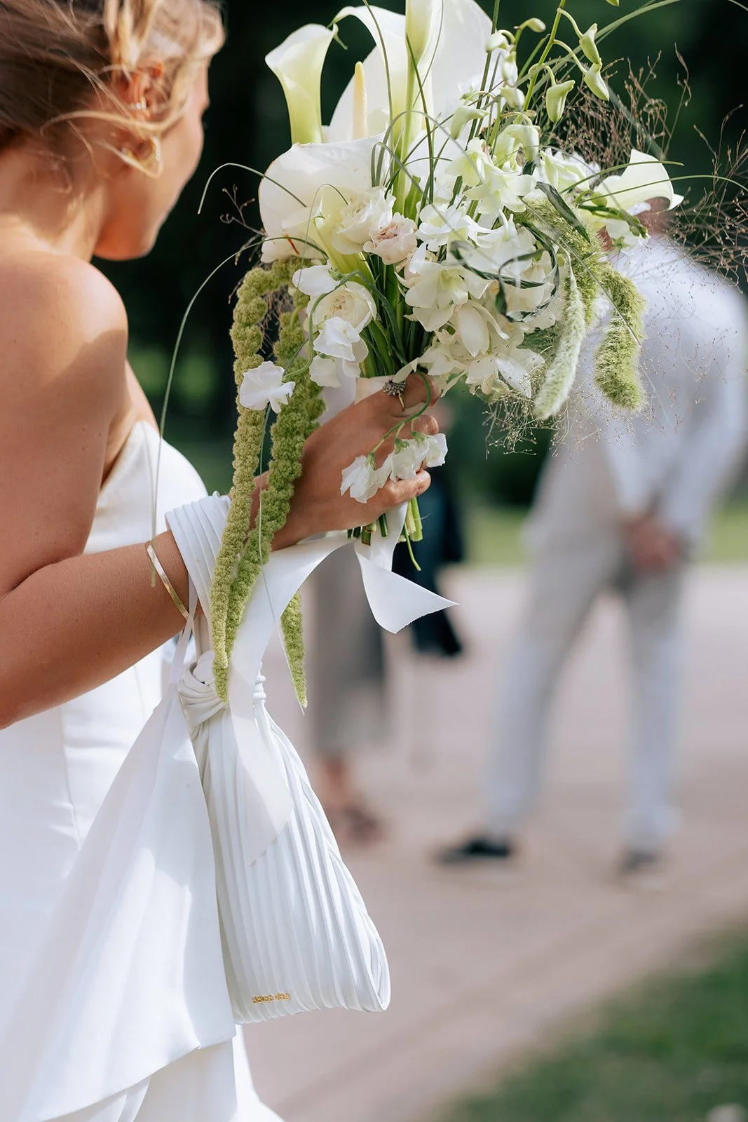 Whimsical floral arrangements for a wedding in Niagara using pastel seasonal flowers and unique textures