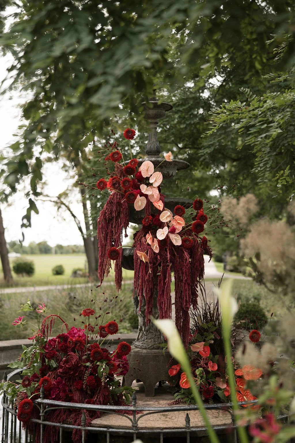 “A luxurious wedding celebration brought to life with cascading floral designs and stunning fountain moments. Expertly crafted by a luxury florist for unforgettable elegance and romance"