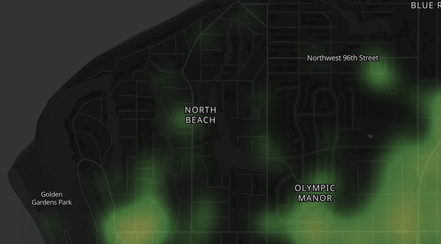 A map showing parts of North Beach, Olympic Manor, and Golden Gardens Park with hotspots and street labels, dark background with green glow highlights.