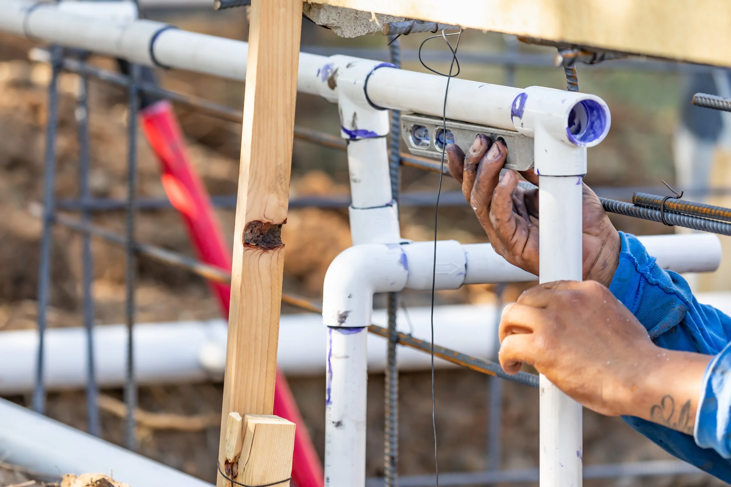 Plumber Installing PVC Pipe Sept 11 2024.jpg