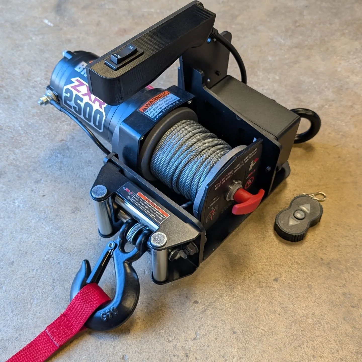 My portable winch design. Heavy duty steel construction, Milwaukee M18 powered, Ergonomic 3D printed handle, harbor freight 2500zxr winch with wireless remote. 

#milwaukee #harborfreight #winch #3dprinting #sendcutsend