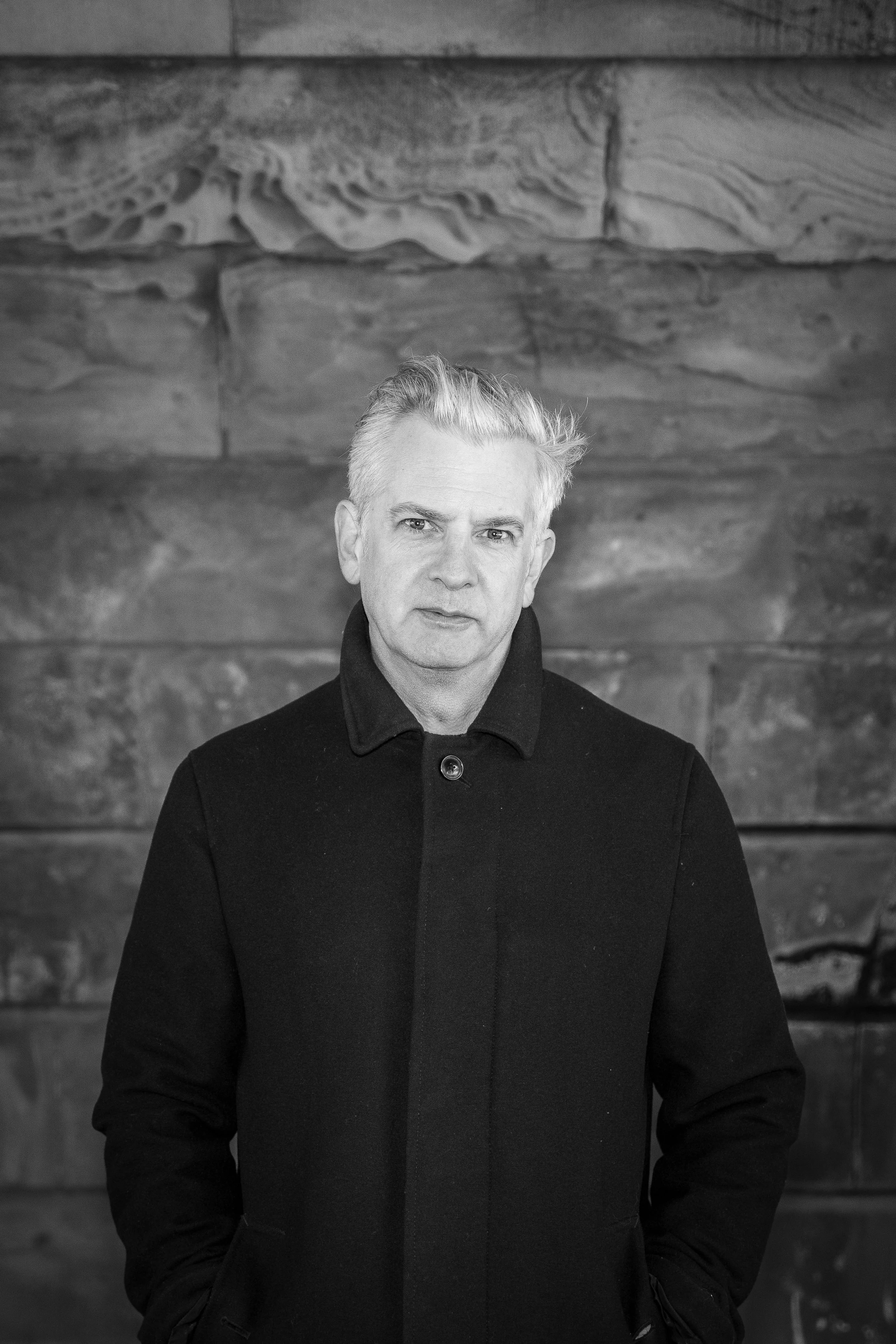 Professional outdoor headshot of a man by NYC headshot photographer Sean Broedow