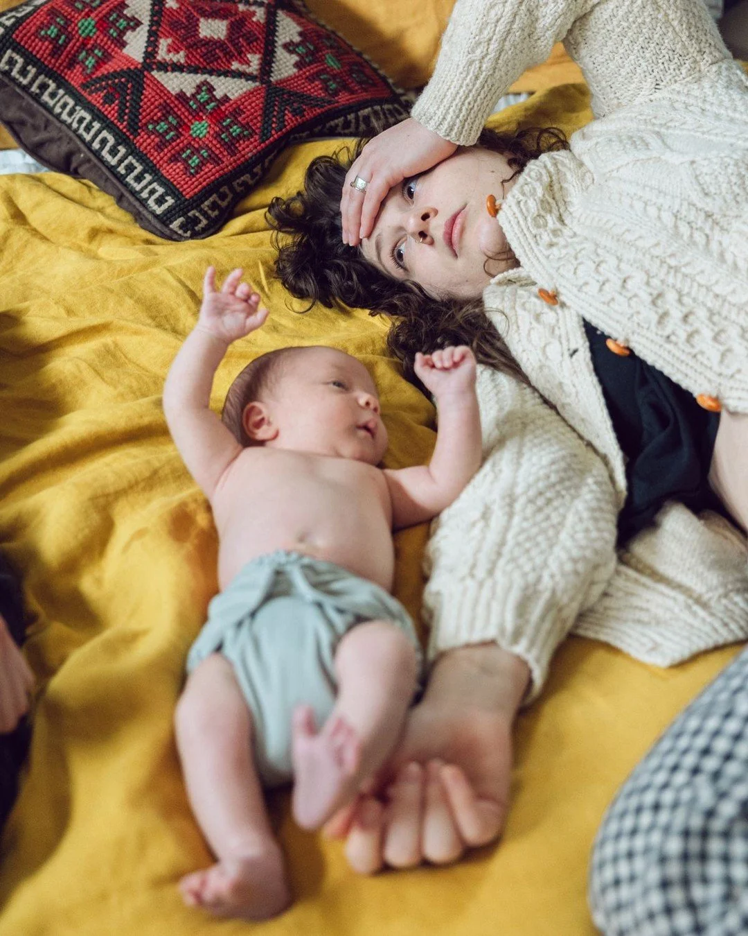 Tired, happy, healing, overwhelmed, grateful: postpartum is an amalgamation of it all. When taking photos of a newly postpartum family, I'm making pictures of the full gamut of the experience. Those perfect feet, your wonder at this new human, and th
