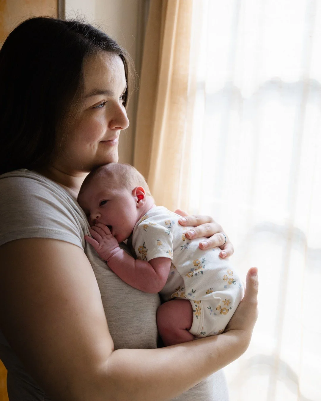It's no small thing to have someone into your home to take pictures of you when you are in the depths of postpartum. It can be hard to see the importance of it when you're covered in milk and spitup, have few clothes that fit, and haven't slept a ful