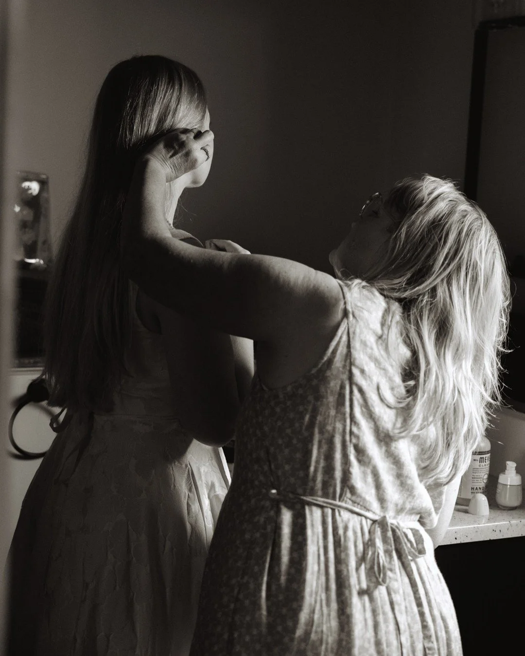 Getting ready is my favorite part of a wedding day to photograph. The casual, intimate moments between loved ones are what I'm most drawn to and this time of day is just full of them.⁠
⁠
This was such a special day for J&amp;C and it was such a treat