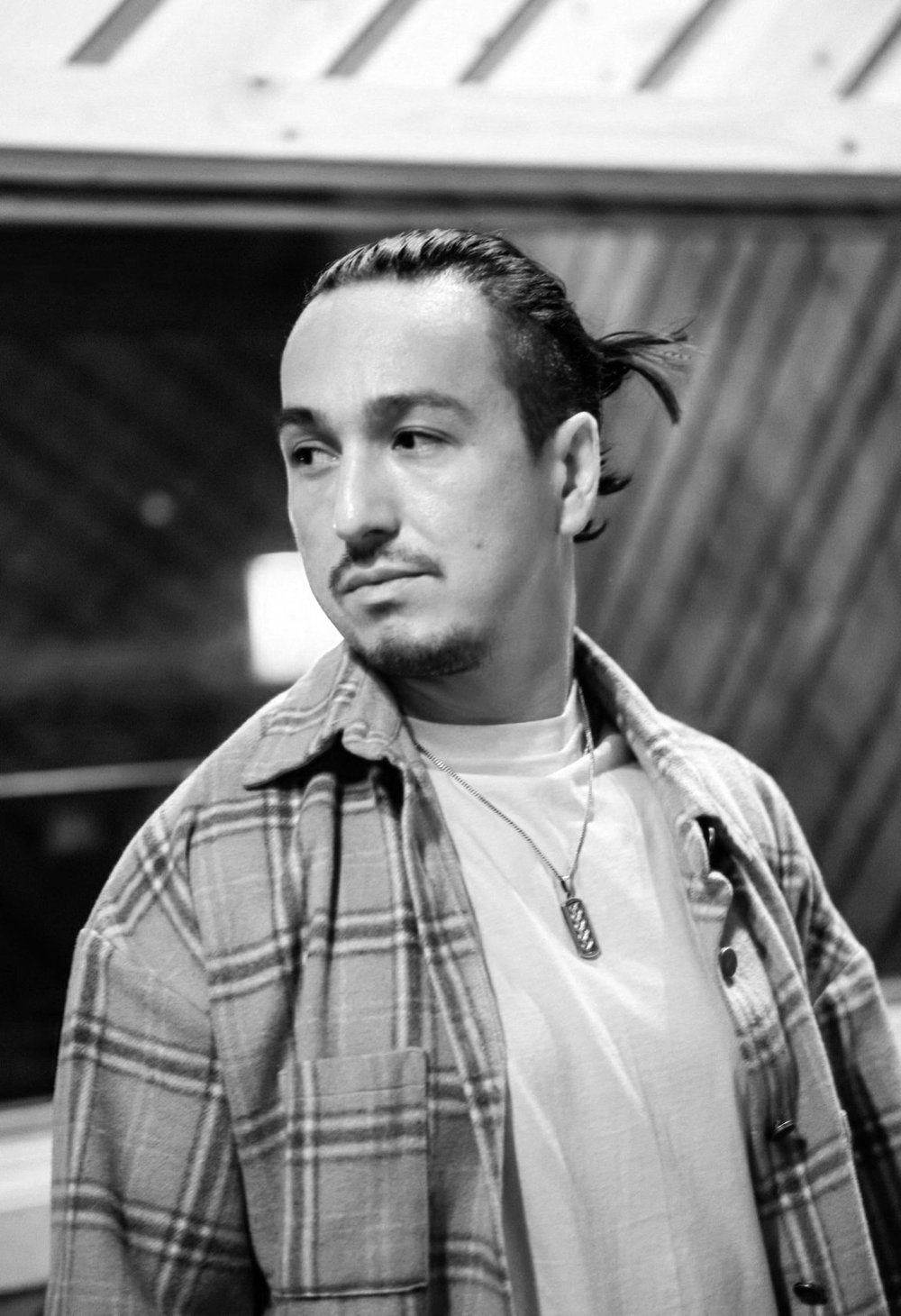 Black and white portrait of Nigel Dean, mixer and producer at Phaser Control Recording Studio.