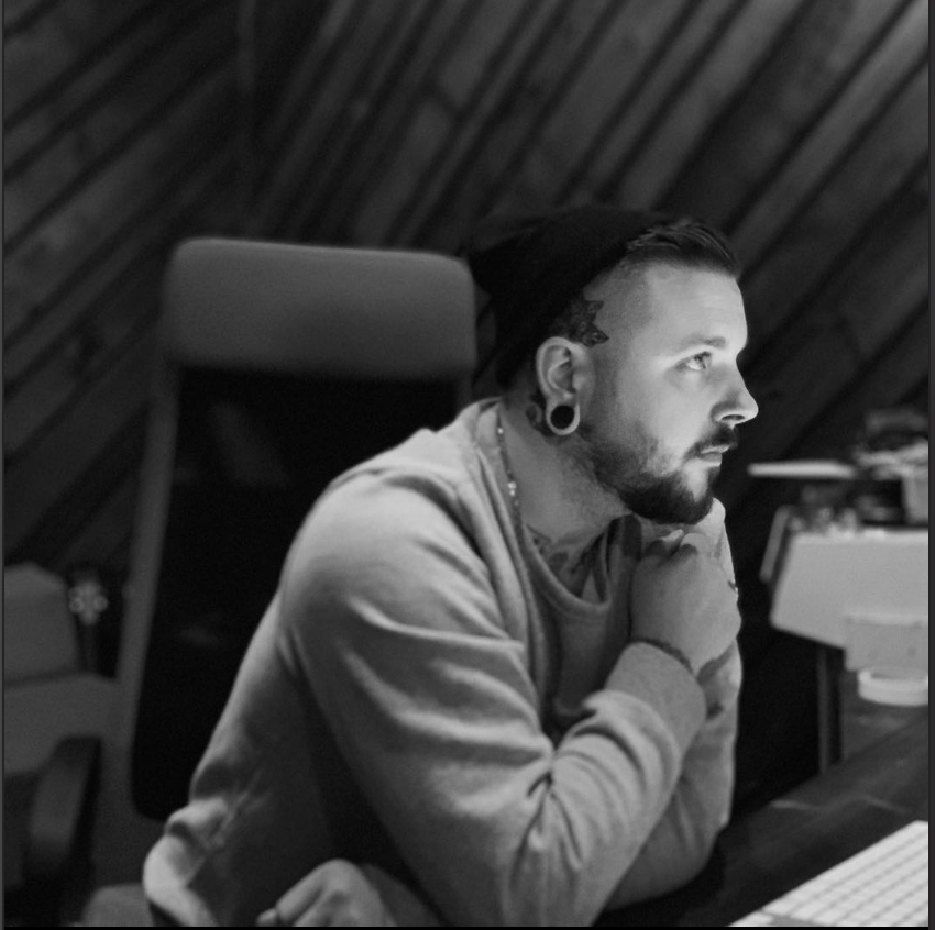 Black and white portrait of Patrick Heaney, head engineer at Phaser Control Recording Studio.