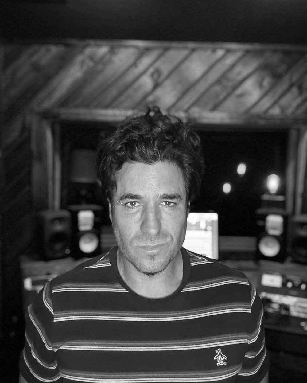 Black and white portrait of Timothy Joseph, owner of Phaser Control Recording Studio.