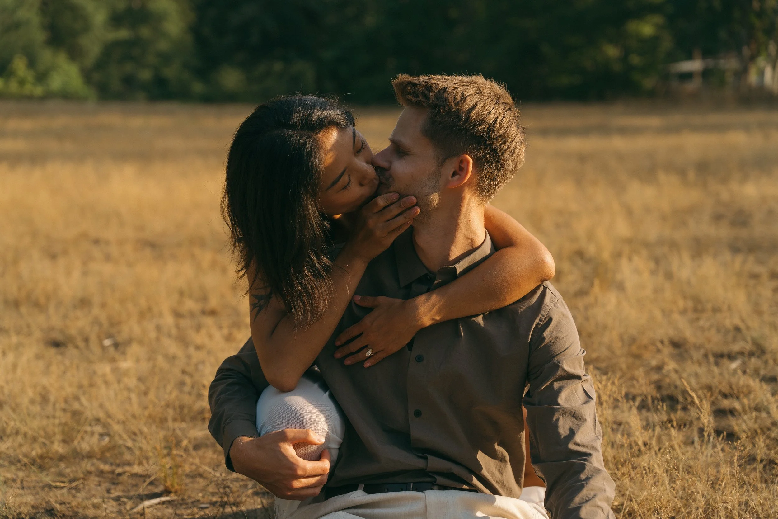 couples golden hour engagement session in the mountains and a field in Squamish BC