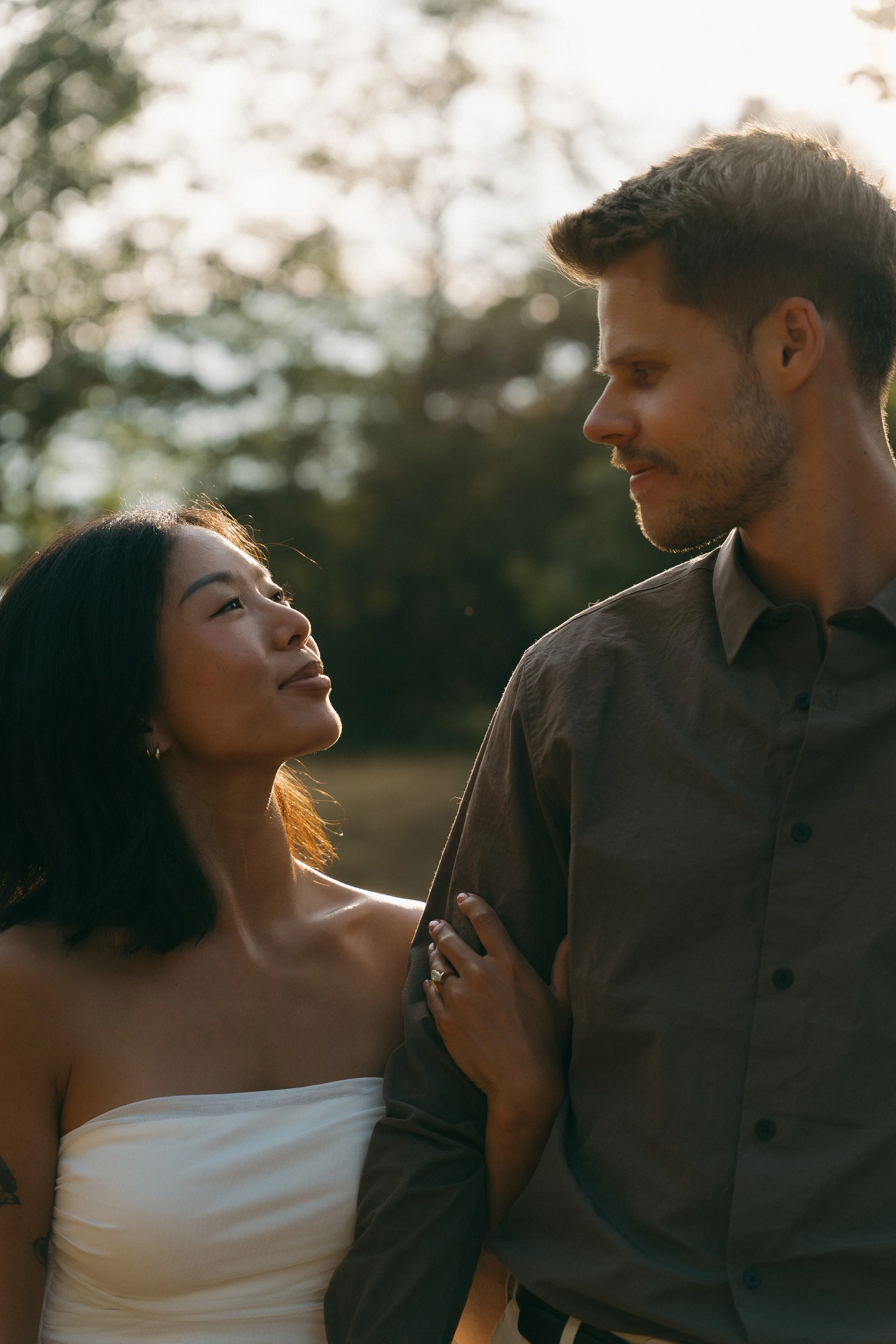 couples golden hour engagement session in the mountains and a field in Squamish BC