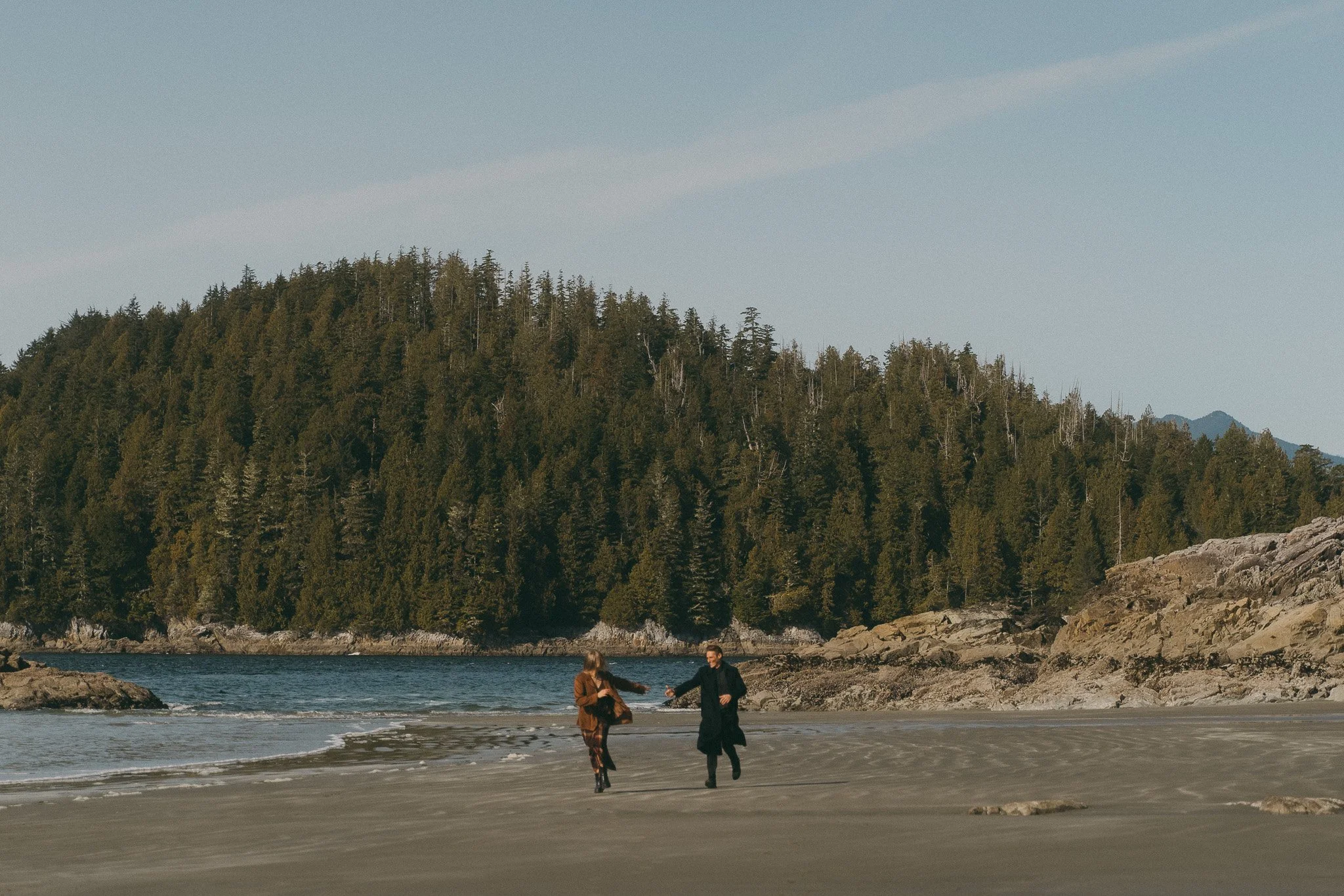 Golden hour adventurous couples engagement session in Tofino BC